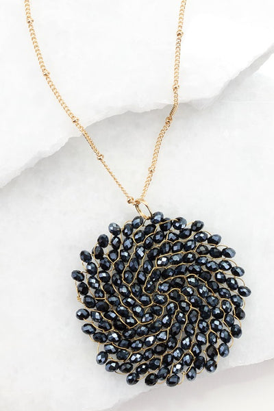 This 32 inch intricate crystal wire link beaded pendant long necklace by Urbanista adds the right bling to any top or dress. Now available in Black, Rose Gold, Black Diamond,Hematite, Bronze, Matte Gold, and Ivory!