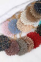 This 32 inch intricate crystal wire link beaded pendant long necklace by Urbanista adds the right bling to any top or dress. Now available in Black, Rose Gold, Black Diamond,Hematite, Bronze, Matte Gold, and Ivory!