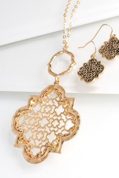 You can't go wrong with this lovely quatrefoil filigree necklace from Urbanista. It is 30" long with a 3" extender and comes in Gold/Silver, Silver, and Gold.