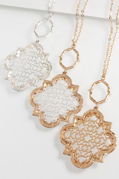 You can't go wrong with this lovely quatrefoil filigree necklace from Urbanista. It is 30" long with a 3" extender and comes in Gold/Silver, Silver, and Gold.