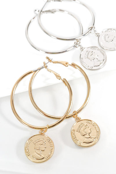 These lovely antique coin charm hoop earrings are brought to you by Urbanista. Pick your favorite color, gold or silver.