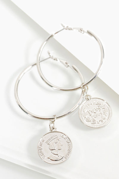 These lovely antique coin charm hoop earrings are brought to you by Urbanista. Pick your favorite color, gold or silver.