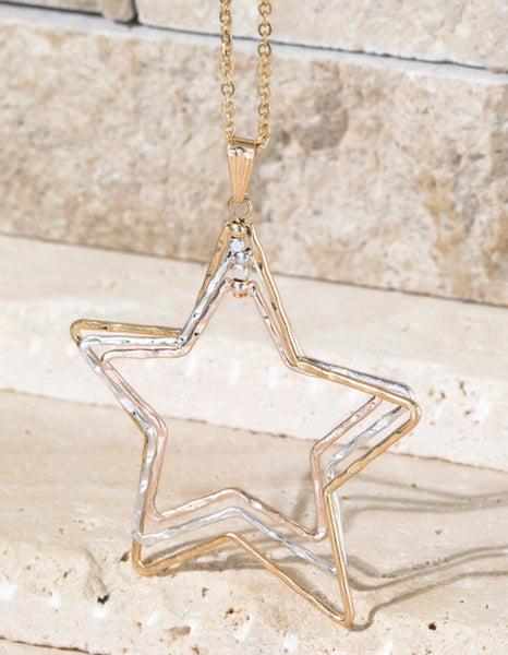 Show you are a star with this long 31 inch necklace has a beautiful hammered metal star pendant in gold or mixed metals. The pendant is approximately 2 1/4 inches.