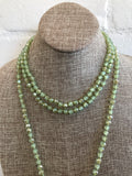 So in and so versatile! This light sage green necklace is 72 inches long and best of all....hand knotted with matching thread. The crystal beads are faceted giving this necklace sparkle. Wear it long, wrap it once for choker look or even three times! This will be one you wear over and over.