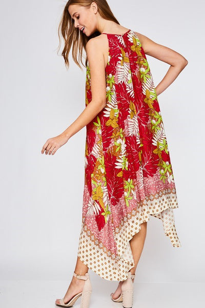 This shabby chic lined tropical print dress from LLove features bold colors, an asymmetrical hem, and a key-hole back. Comes in Small - Large. So pretty!