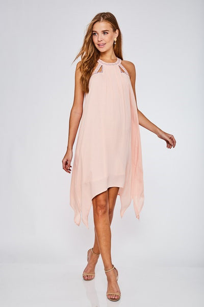 This gorgeous lined haltered neck dress from LLove features beautiful embroidered detail, an asymmetrical hem, and back button closure. Comes in Small - Large. Choose Light Coral or Off White.