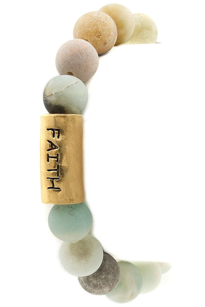 This lovely semi-precious stretch stone bracelet is brought to you by Illord. It features genuine stones and is engraved with the word "Faith". Comes in Multi and White.