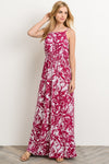 This tropical print floor length dress by Gilli  is features a lovely magenta color with tie in the back to keep the shoulder straps from slipping. You will never worry about wrinkles with this poly spandex knit. 
