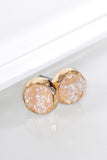 You will love wearing these round druzy earrings by Urbanista. Comes in Opal, Gold, and Hematite.