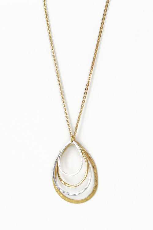This layered textured tear drop pendant necklace is brought to you by Urbanista. Comes in Gold and Mixed Metal.