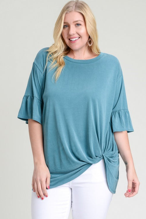 This lovely teal top from Jodifl features half trumpet sleeves and a twist from. Made of modal rayon. Comes in 1X - 3X.