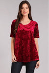 Sparkle up your day with the rose wine velvet top from Chris and Carol. So versatile and comfortable to wear to work or to your holiday function. It features a rounded neckline, short sleeves, and the back is rounded and a little lower in length than the front. Comes in small, medium, and large.