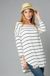 Stripes are key with this ivory and black striped tunic top from Lovely J. Pair it with your favorite jeans for a fantastic casual look. Comes in S-3X.