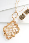 You can't go wrong with this lovely quatrefoil filigree necklace from Urbanista. It is 30