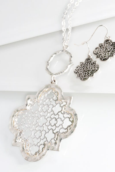 You can't go wrong with this lovely quatrefoil filigree necklace from Urbanista. It is 30" long with a 3" extender and comes in Gold/Silver, Silver, and Gold. 