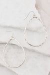 These hammered metal tear drop earrings hang perfectly. Comes in silver and gold and hang approximately 2