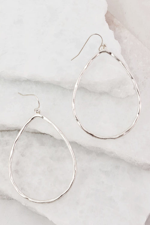 These hammered metal tear drop earrings hang perfectly. Comes in silver and gold and hang approximately 2".