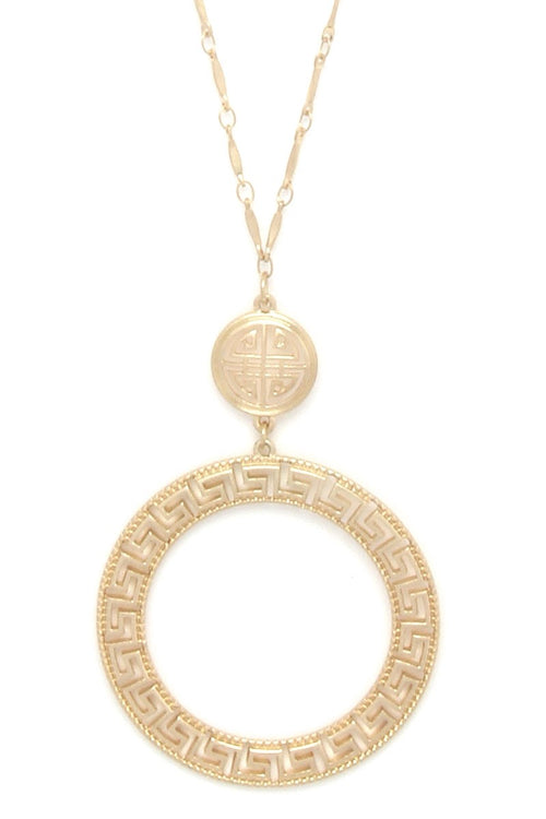 This lovely cut out circle pendant necklace from Illord is 34" long and comes in gold, rose gold, and silver.