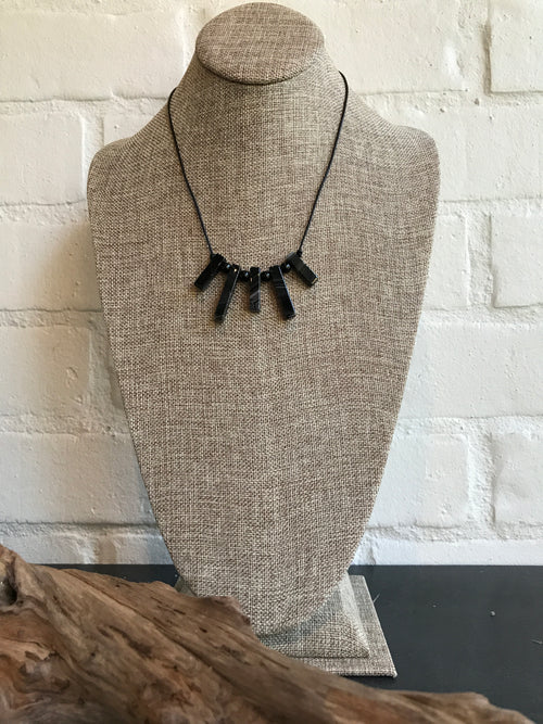 Another custom design by Dixie Klein! This black leather and black agate necklace is a showpiece and is 18 inches long. ﻿