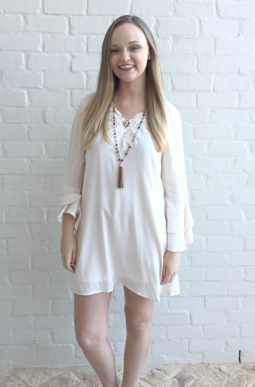 This feminine lightweight tunic dress by Jodifll has a crocheted yoke and long tiered sleeved.  It's also lined! Perfect for date night or an evening with the girls. So gorgeous!