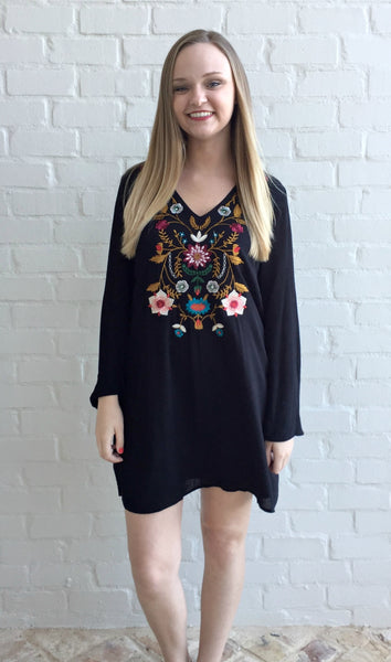Summer is in the air! This black tunic dress by Jodifl has beautiful embroidered detailing on the front and along the neckline and has long flared sleeves. It is also lined. Add sandals and voila - another great outfit from Magnolia Road Boutique. 