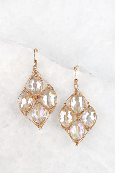 These crystal chandelier wire wrapped earrings are just gorgeous. They are approximately 2" by 2" and hang perfectly. Comes in crystal and champagne.