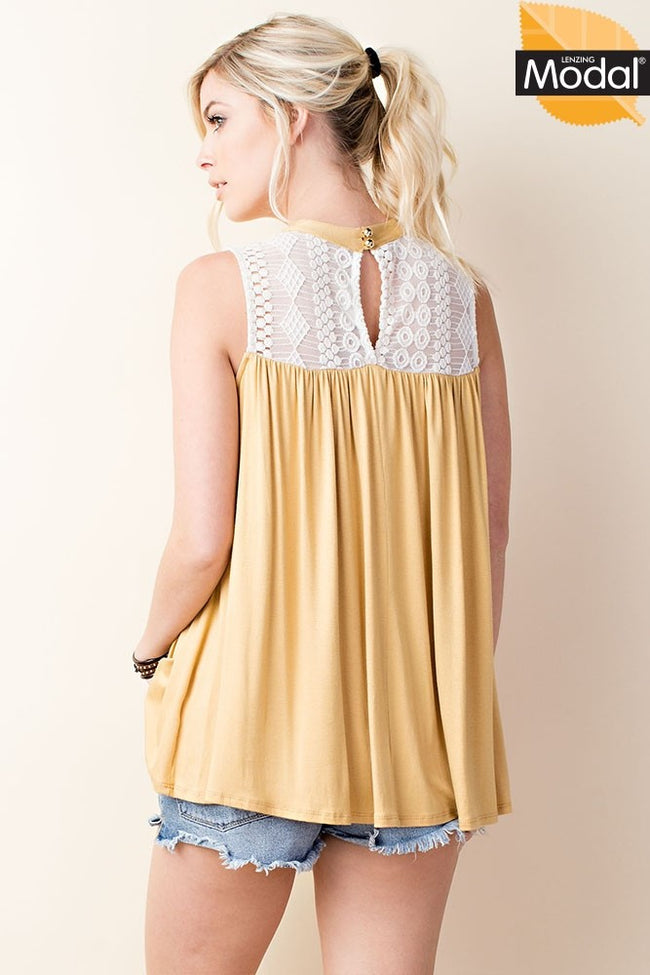 This sleevless modal top from Eesome features super soft fabric, a lace yoke, and a relaxed fit. Comes in S - L. 