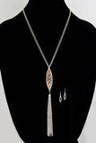 This beautiful contrast filigree marquee shape pendant necklace and tassel chain comes with matching earrings that compliment a variety of dresses and tops. It is 32