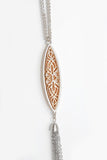 This beautiful contrast filigree marquee shape pendant necklace and tassel chain comes with matching earrings that compliment a variety of dresses and tops. It is 32