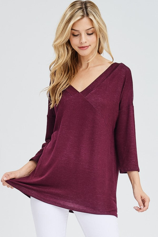 You will be game-day ready in these striking navy and burgundy tops from Eesome. They feature 3/4 length sleeve, a relaxed fit, and a ladder cutout in the back. Comes in small, medium, and large. 