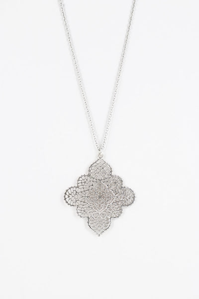 This 32" filigree marquee flower pendant necklace will make a fine addition to your accessory collection. Comes in gold and silver.