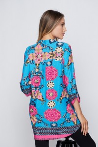 This show stopping cerulean blue floral top from Honeyme won't last long! It features and v-notched neck, tab 3/4 sleeves, and a tunic length. The colors are glorious! Comes in S-3X.