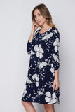 This gorgeous navy floral dress from Honeyme features a relaxed fit, 3/4 sleeves, and a generous length. Comes in S - L.