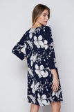 This gorgeous navy floral dress from Honeyme features a relaxed fit, 3/4 sleeves, and a generous length. Comes in S - L.
