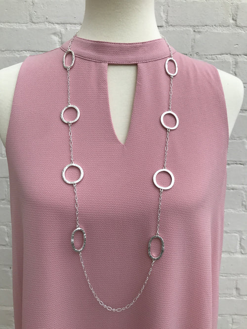It's a staple in any jewelry collection and we have it in gold or silver. Eight hammered circles stationed on a simple chain speaks elegance on any top or dress. Affordable fashion....serious style. 38 inches with a 3 inch extender.  