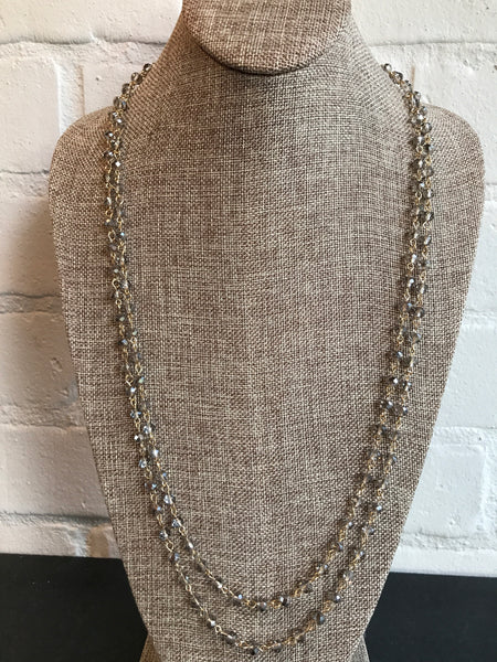 ﻿You will want to toast this 60 inch glass champagne link necklace. It's versatile and a great choice for a subtle look. Wear it long or wrapped. 
