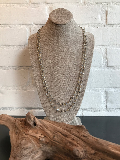 ﻿You will want to toast this 60 inch glass champagne link necklace. It's versatile and a great choice for a subtle look. Wear it long or wrapped. 