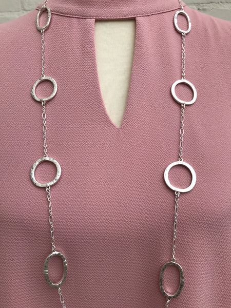 It's a staple in any jewelry collection and we have it in gold or silver. Eight hammered circles stationed on a simple chain speaks elegance on any top or dress. Affordable fashion....serious style. 38 inches with a 3 inch extender.  