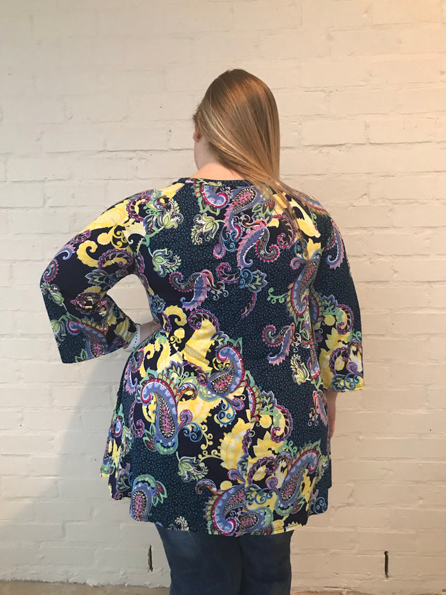 A cute keyhole neck adds charm to this swing tunic top in a blooming floral print. You can pair this with solid color jeans or leggings, it will honestly go with anything! 92% polyester 8% spandex.