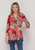 We love this gorgeous red gabby top by Honeyme. It features 3/4 sleeves and a non-wrinkling 100% polyester fabric. Comes in Small thru Large. 