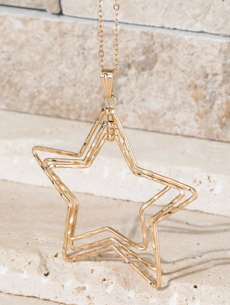 Show you are a star with this long 31 inch necklace has a beautiful hammered metal star pendant in gold or mixed metals.  The pendant is approximately 2 1/4 inches. 