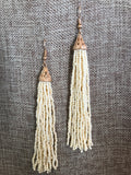 Look stunning in these ivory seed bead tassel hook earrings. Ivory earrings and a swing dress! Ready for anything!