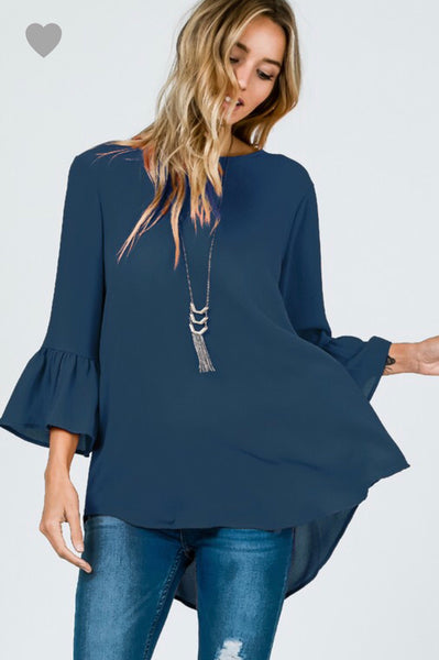 Elevate your style with this easy fit teal ruffle sleeve top by Ces Femme. It features a round neckline with ruffled sleeves and a flattering fit. Our customers tell us they’d like this one in every color! Comes in Small thru 3X!