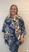 A cute keyhole neck adds charm to this swing tunic top in a blooming floral print. You can pair this with solid color jeans or leggings, it will honestly go with anything! 92% polyester 8% spandex.
