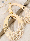 Looking for the perfect versatile earring?  This textured laser cut oval earring can be dressed up or down and comes in silver or gold. It’s approximately 2.4 inches long.