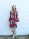 We absolutely love this wrinkle free, deep red, floral dress with ruffle sleeve detail. The colors on this lined dress are gorgeous! Pair it with our large tassel earrings for an awesome look.