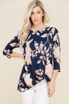 This new Spring top is feminine and sweet with soft pink flowers and taupe leaves on a navy background. It's also knotted for an updated style. Perfect for a girl's night out with jeans or white capris. 94% polyester 6% spandex.