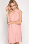 She & Sky created this soft sleeveless dress perfect for a shower or party. The neckline is high with a keyhole and the back has a single fabric covered button. The length on a medium is 36 inches and the dress is fully lined. Available in soft pink or off white. 70% Cotton/30% Polyester.   Fits true to size: Small 2/4, Medium 6/8, Large 10/12