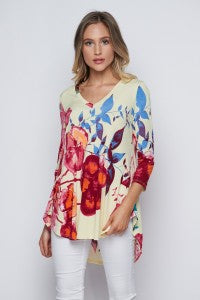 Spring is in the air with this lovely floral top from Honeyme. It features a high/low hem, 3/4 sleeves, and a V-neck. Comes in S-3X.