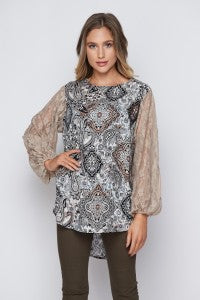 Just Beautiful! This crinkle gauze top from Honeyme features an airy look with lace sleeves and gauze fabric. Comes in S-3X.